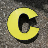 Letter C of yellow and black industrial sign