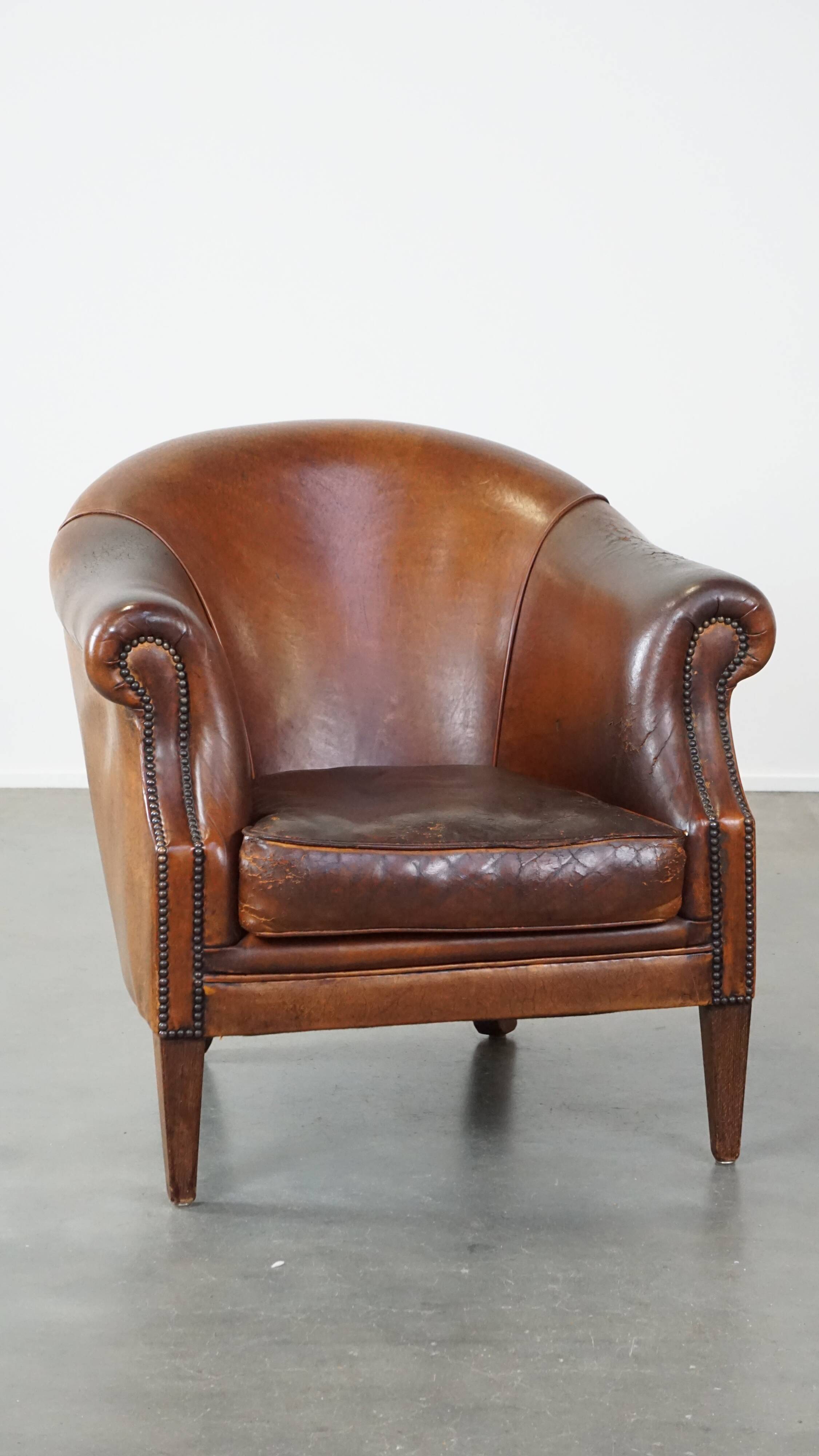 Vintage club armchair in sheepskin leather