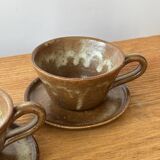 Vintage stoneware cups and saucers
