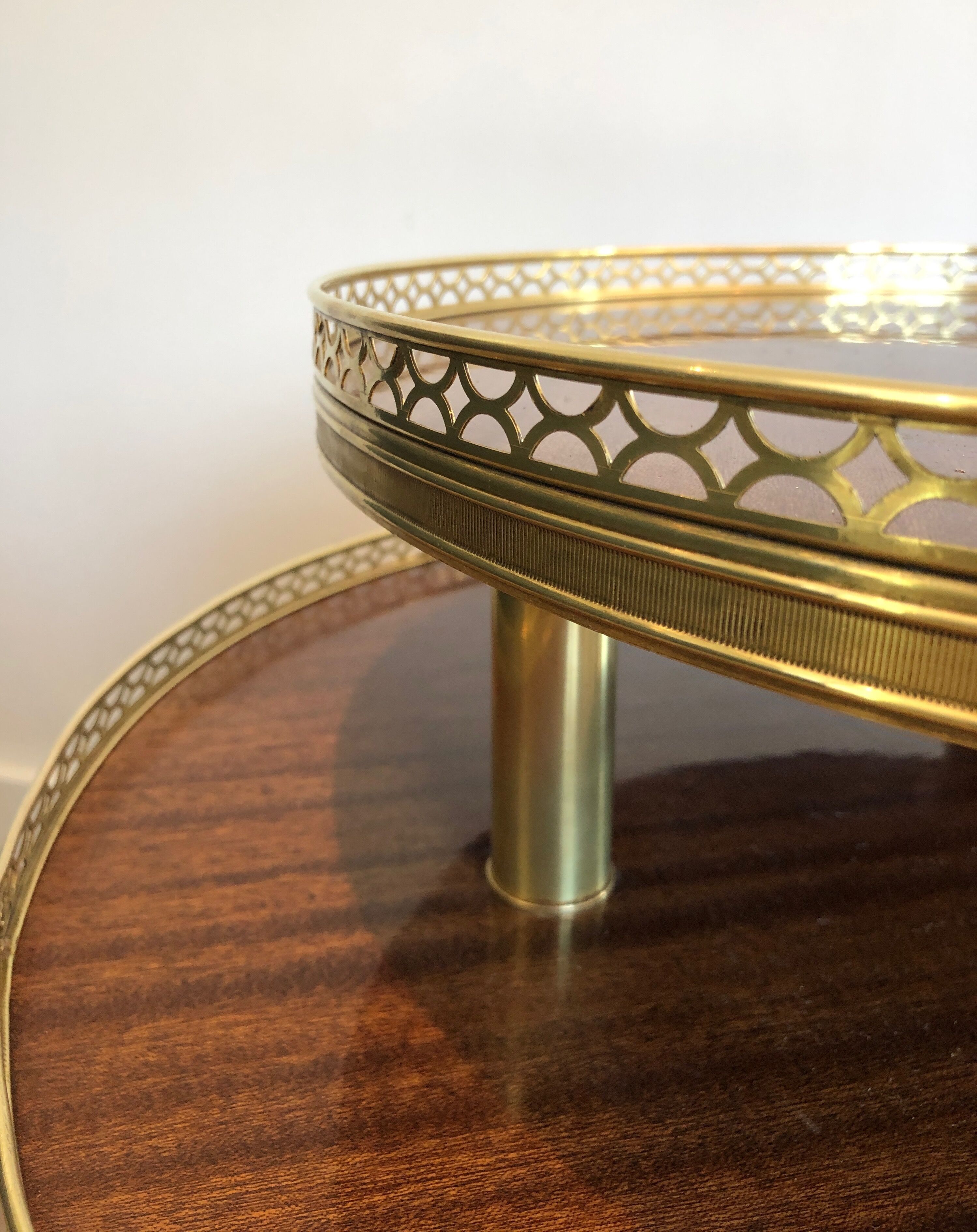 Neoclassical style tripod pedestal in mahogany, brass