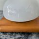 Vintage wall or ceiling light in pine and opaline.