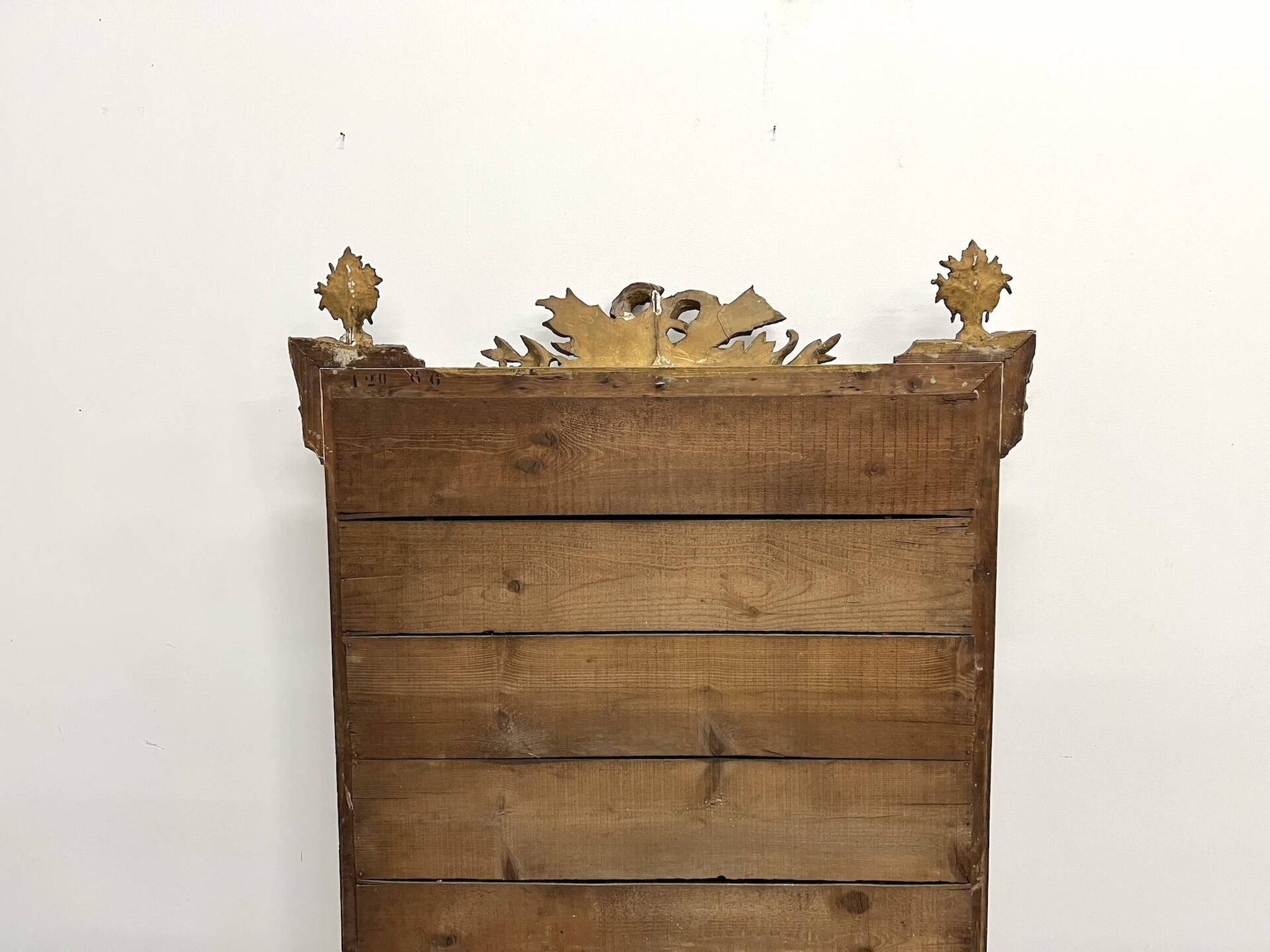 Large antique pediment mirror with mouldings.