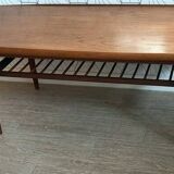 Danish 1960s teak coffee table with slatted shelf.