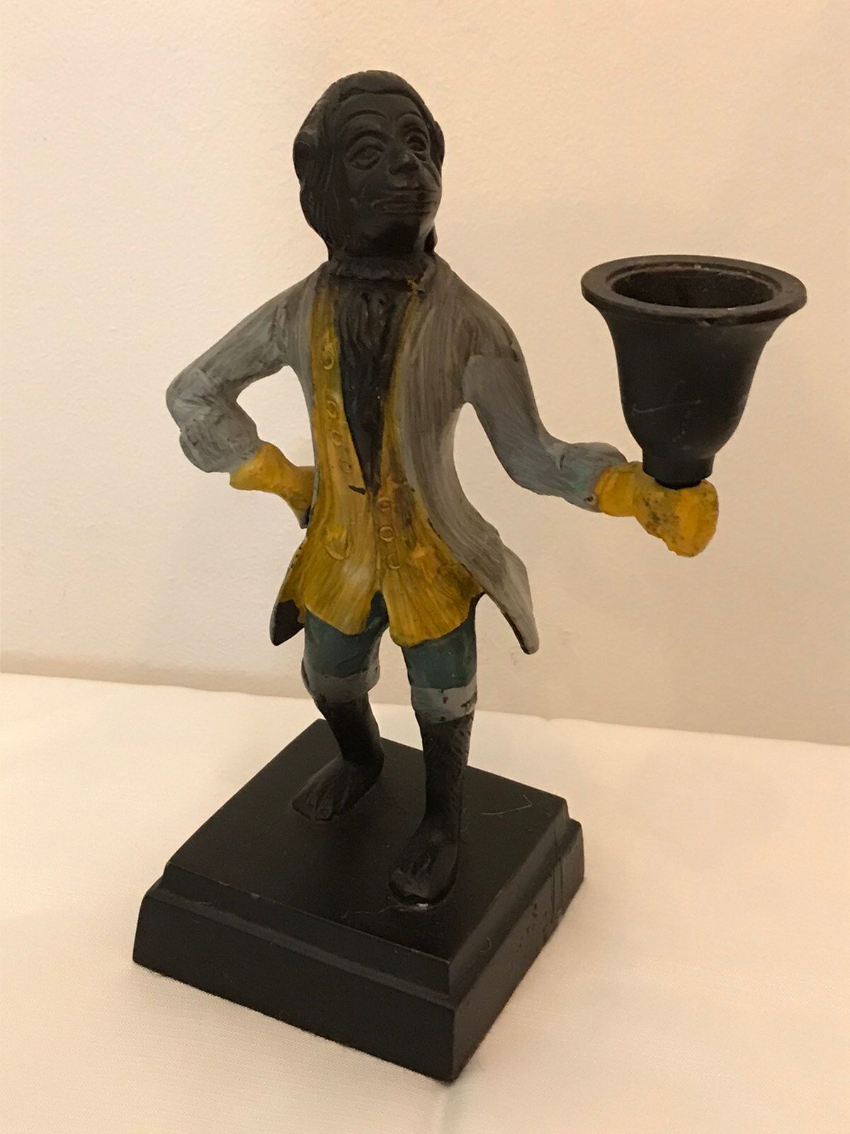 Cast iron servant monkey candle holder