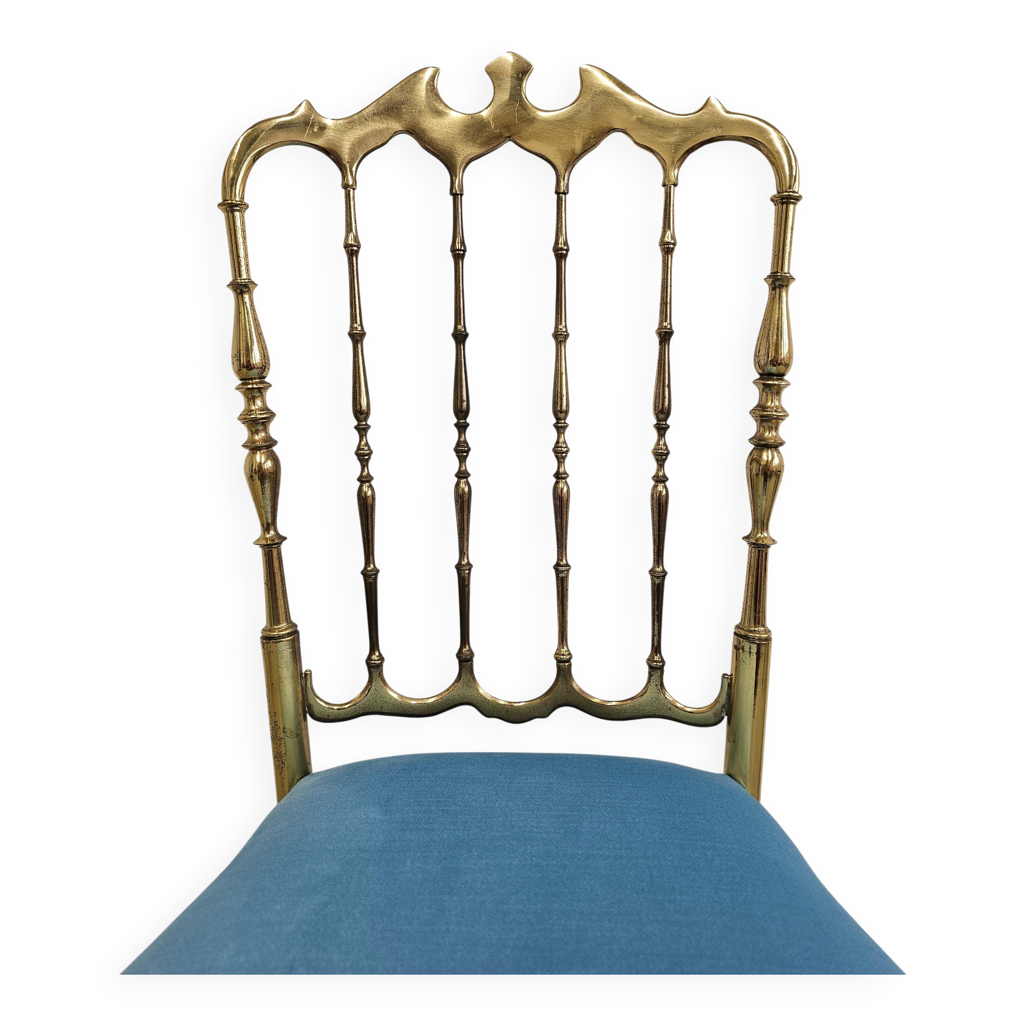Mid-century Chiavari accent chair in solid brass with a plush seat.
