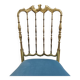Mid-century Chiavari accent chair in solid brass with a plush seat.