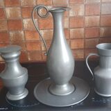 2 pitchers and 1 pewter pitcher