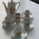 Porcelain dinette for dolls consisting of a coffee maker, cups and saucers, vintage