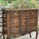 Carved and moulded solid wood commode in the Louis XV style.