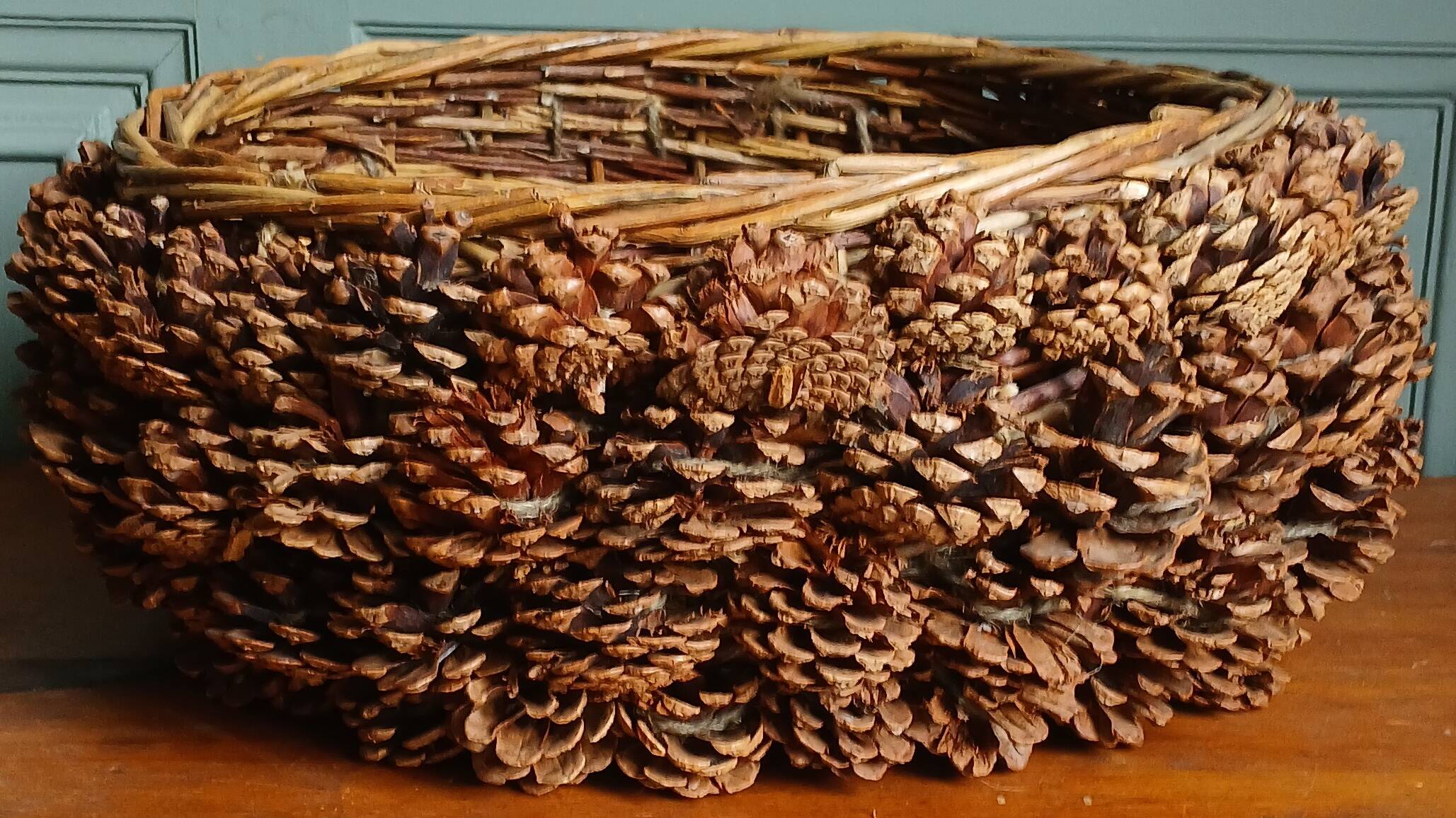 XL handmade wicker & pine cone Adirondack basket, circa 1930.