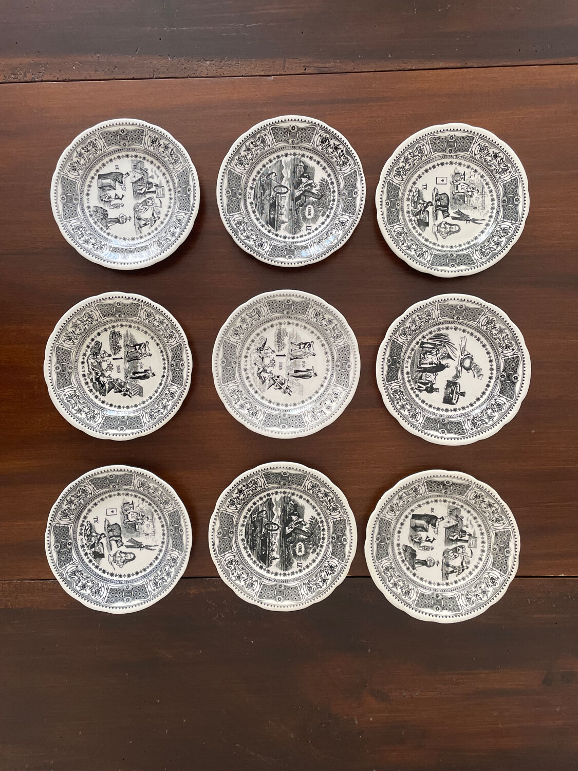 Set of 9 plates Gien "rebus".