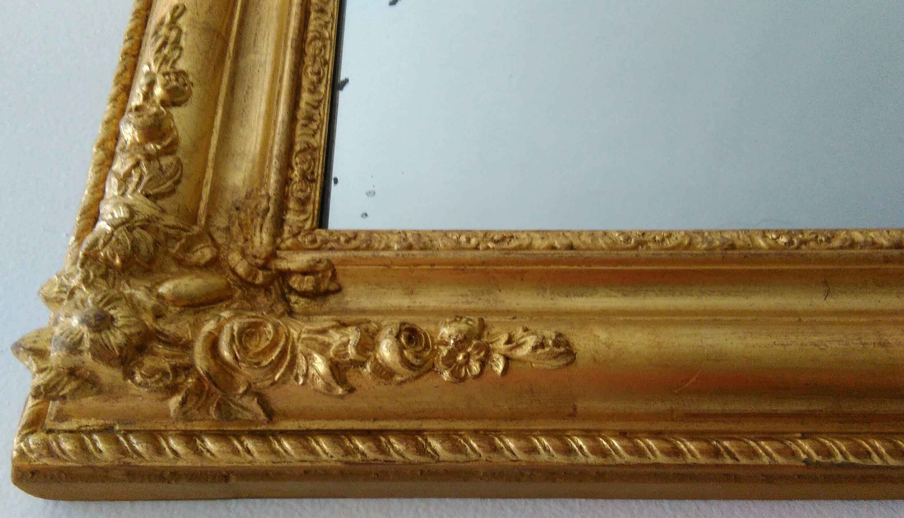 Golden romantic mirror with gold leaf