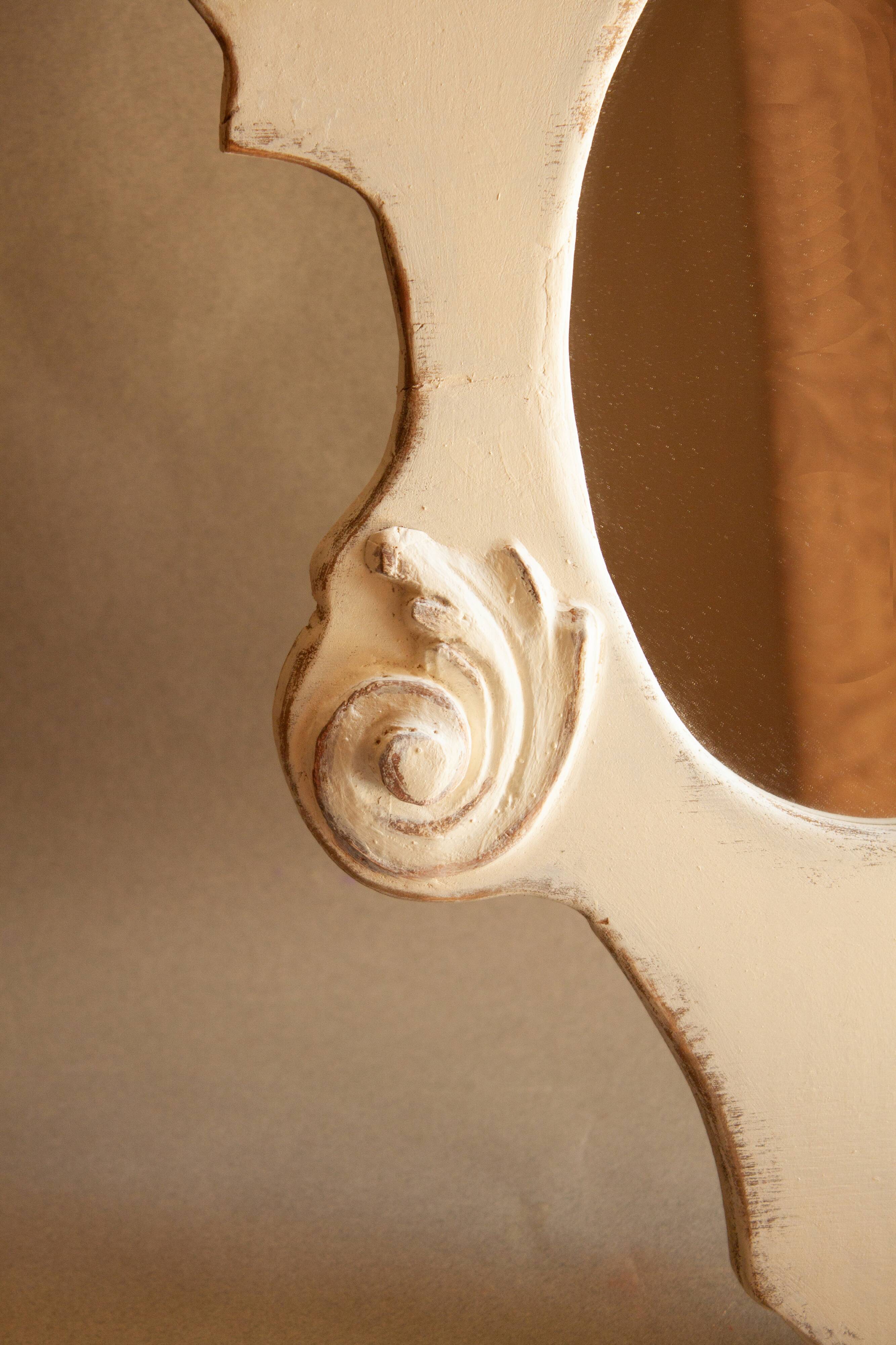 Vintage carved wooden mirror.