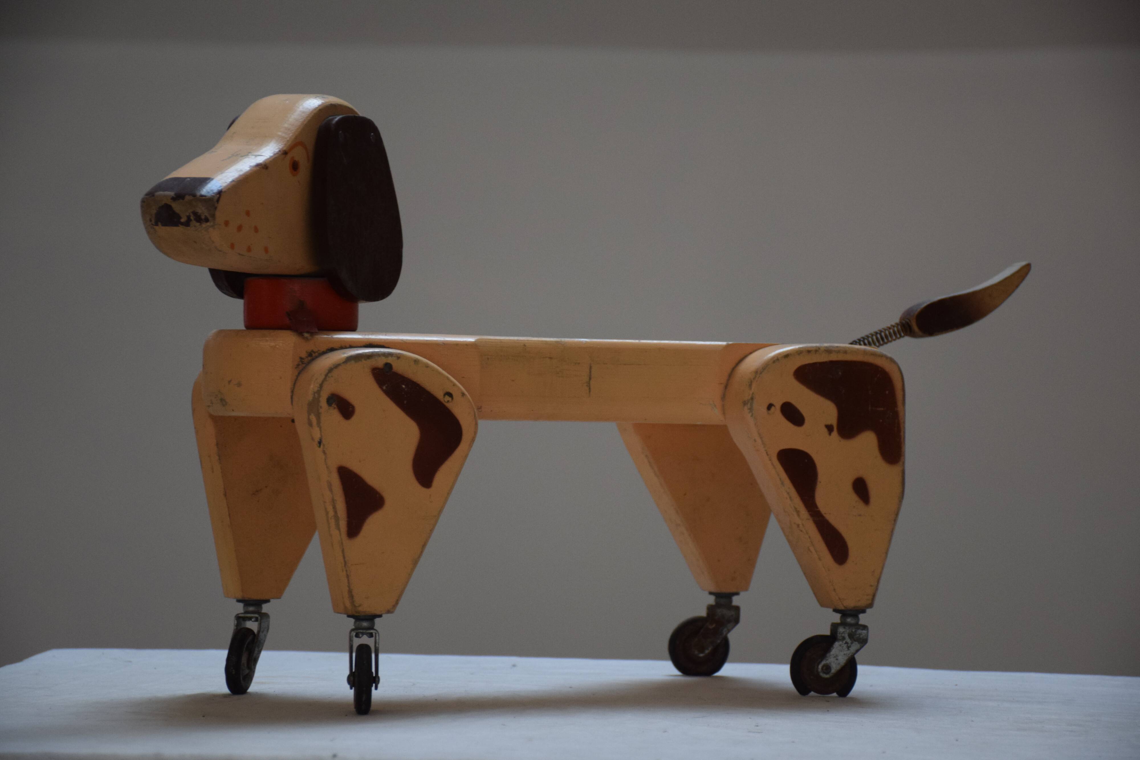 Children's wooden dog and camel