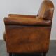 Charmant et robuste fauteuil en cuir de mouton, grand modèle