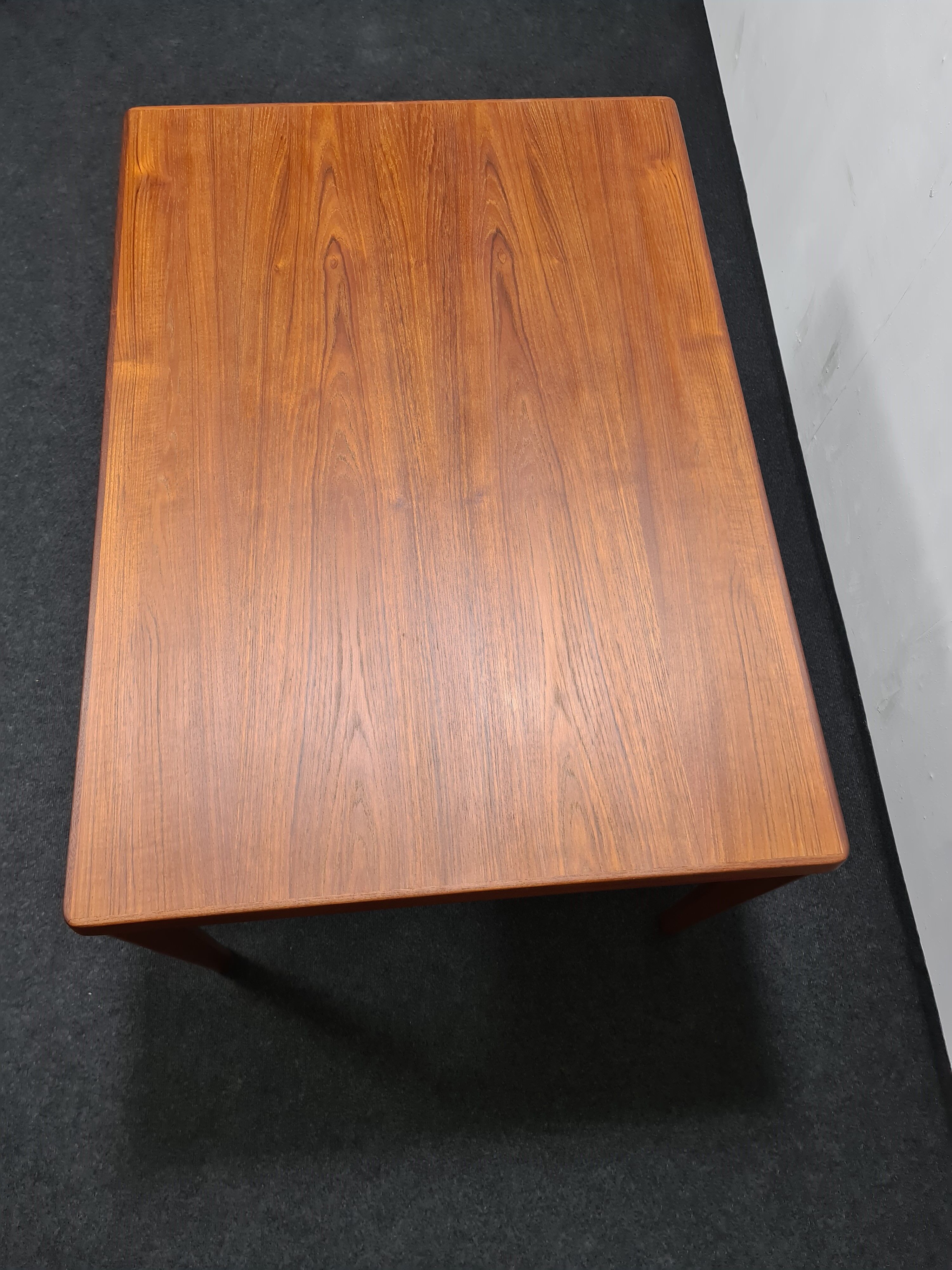 Teak Danish design dining table by Henning Kjaernulf