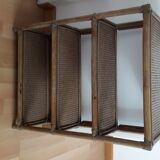 On feet vintage rattan shelf