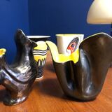 Vase with symbols and yellow interior