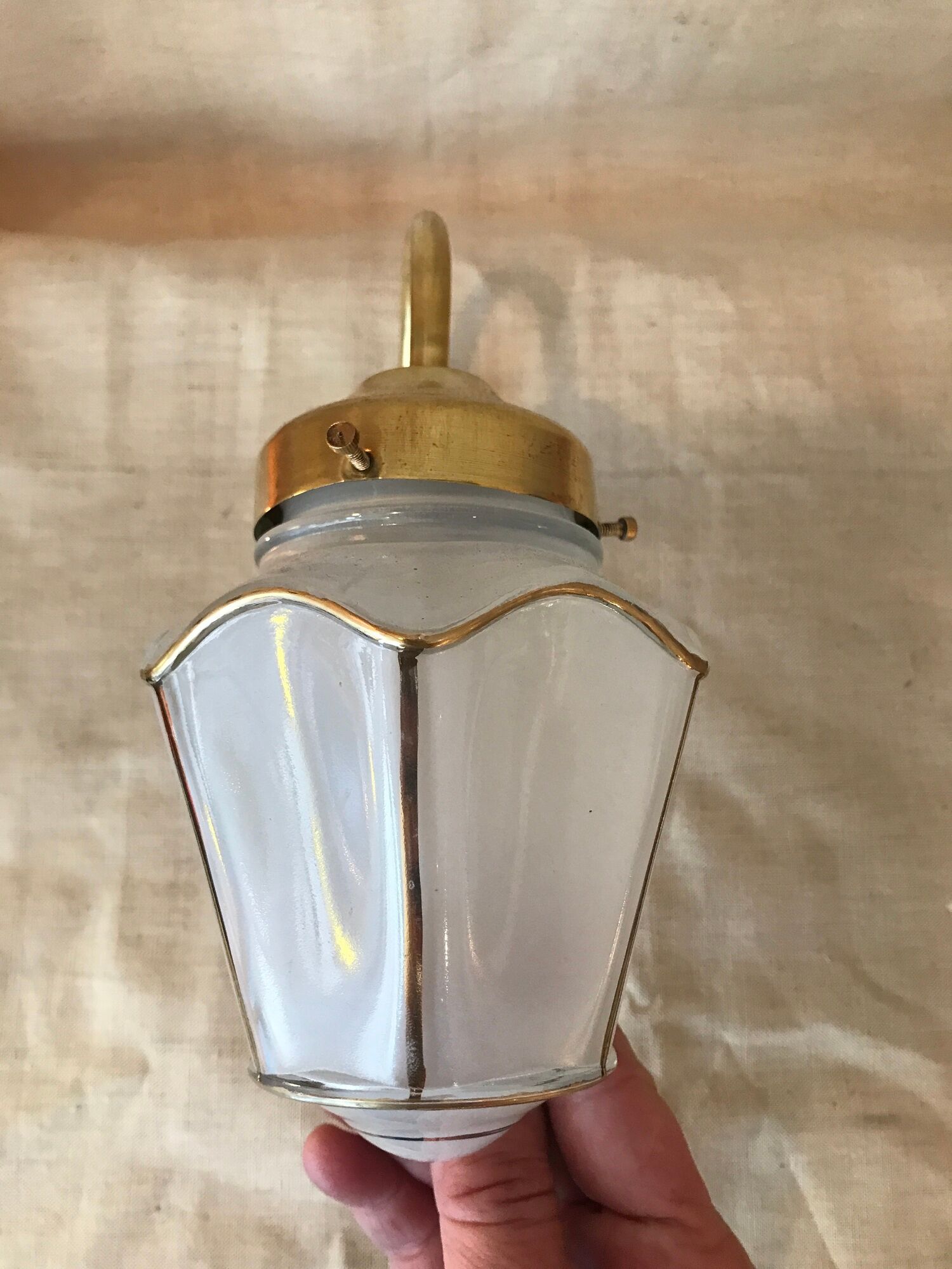 Pair of 1960 brass wall lamps and gilded frosted glass