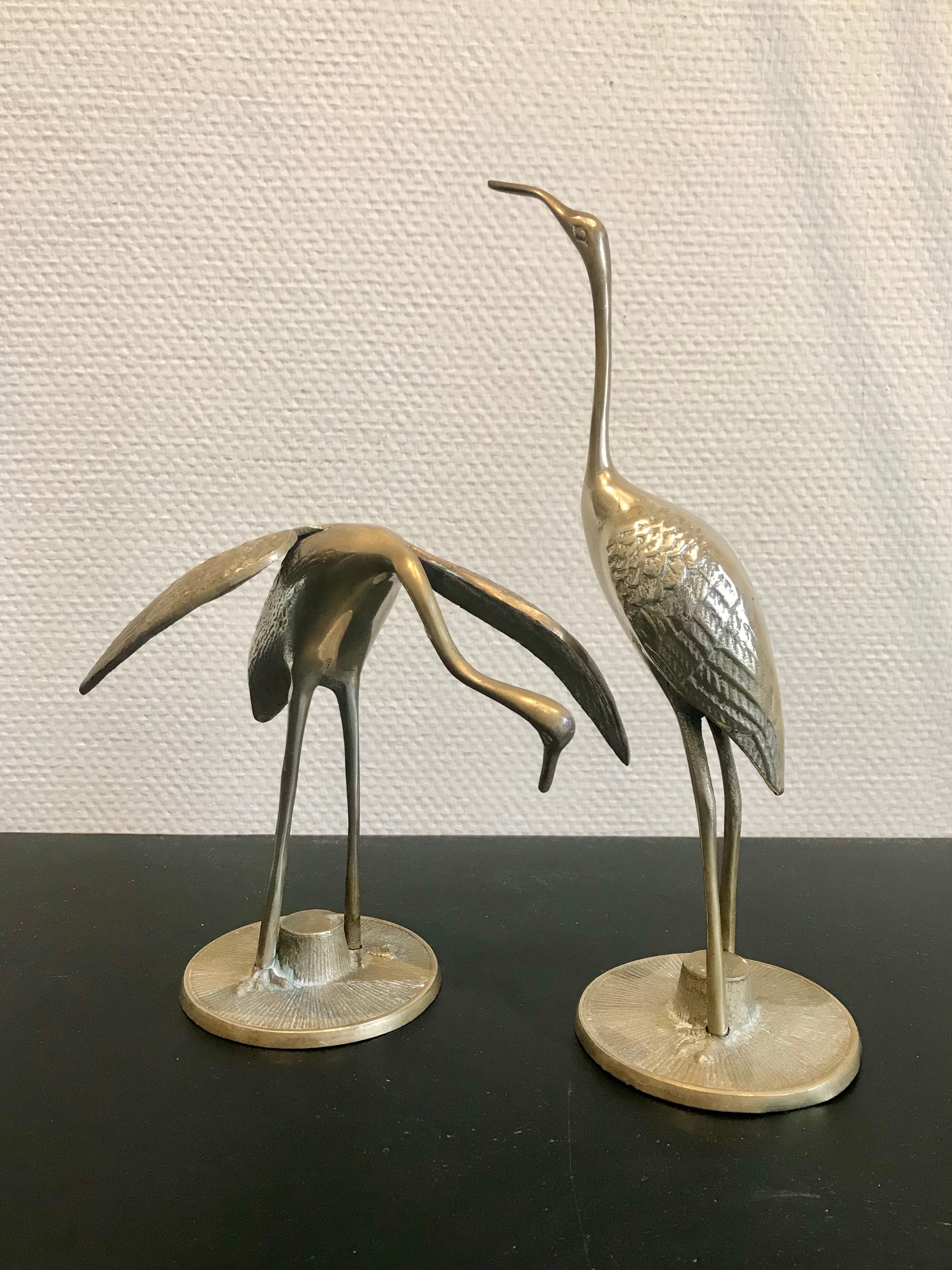 Couple of brass birds