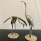 Couple of brass birds