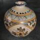 Vintage vase shaped terracotta ball with handheld paint decoration polychrome signed