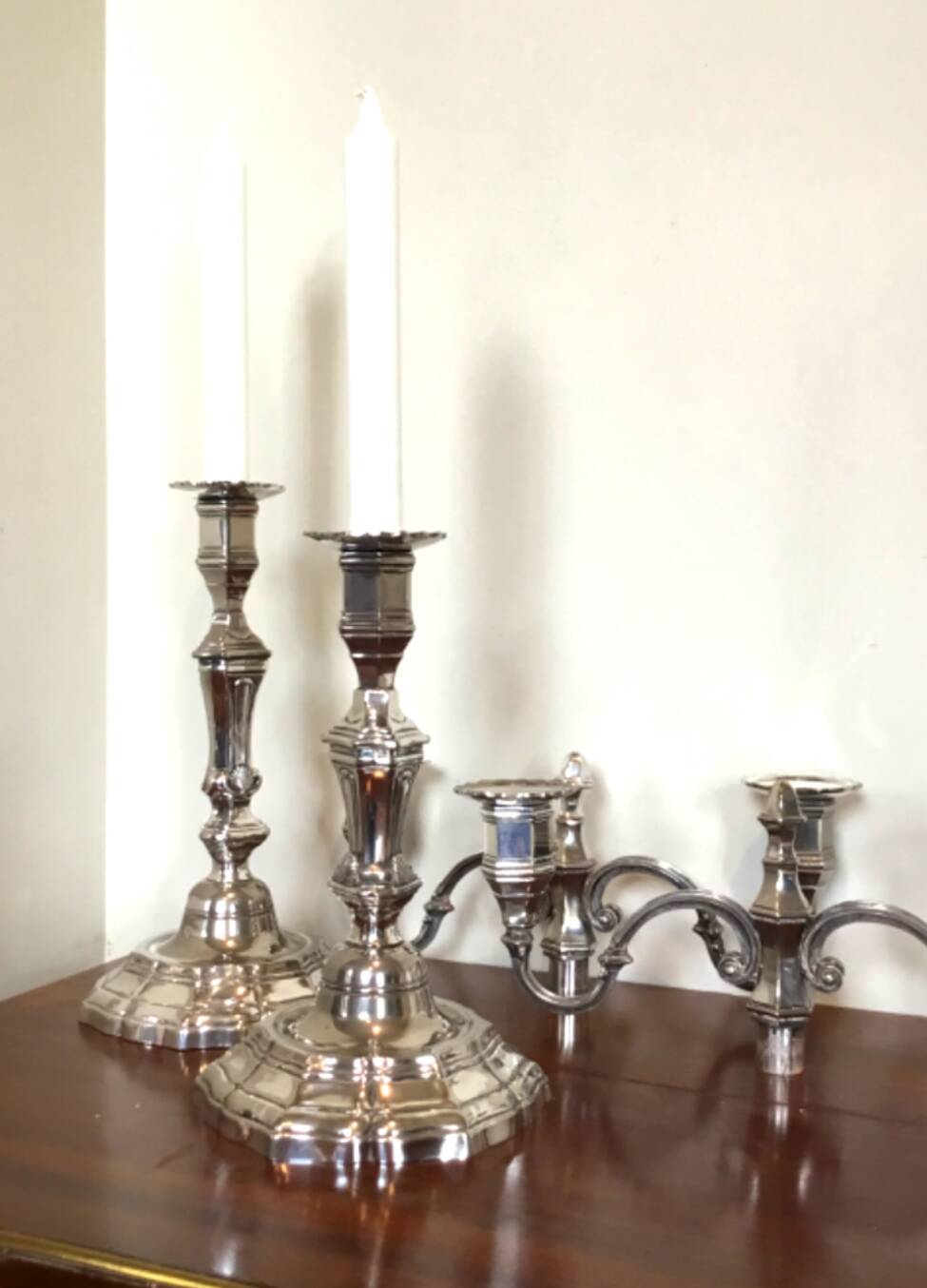 Pair of silver-plated metal candelabra in the Regency style