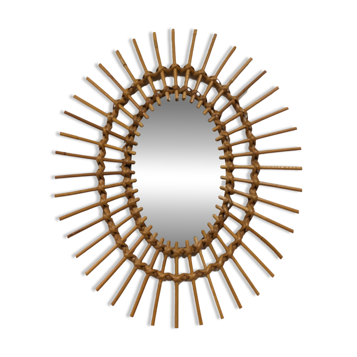 Oval rattan mirror, France circa 1960.