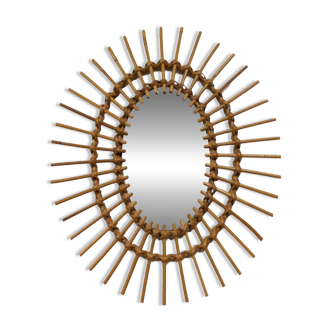 Oval rattan mirror, France circa 1960.