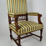 Neo-Renaissance walnut armchair with lion heads, circa 1880