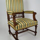 Neo-Renaissance walnut armchair with lion heads, circa 1880