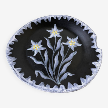 Black ceramic plate from the 60s