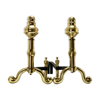 Pair of iron and brass pegs, circa 1930