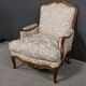 Queen's bergère in carved beech, Louis XV period – mid 18th century
