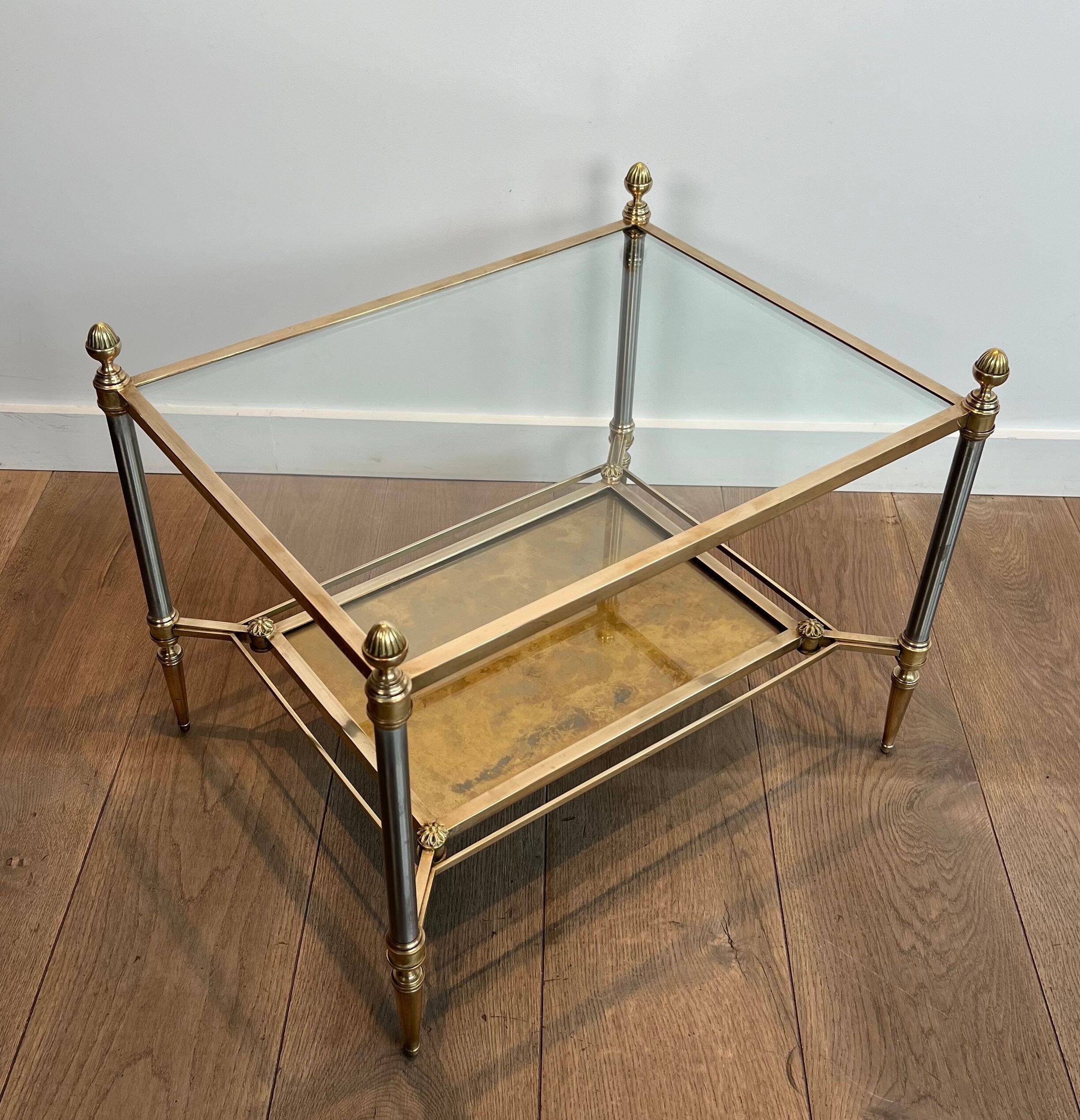 Pair of neoclassical side tables in steel and brass by Maison Jansen.