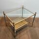 Pair of neoclassical side tables in steel and brass by Maison Jansen.