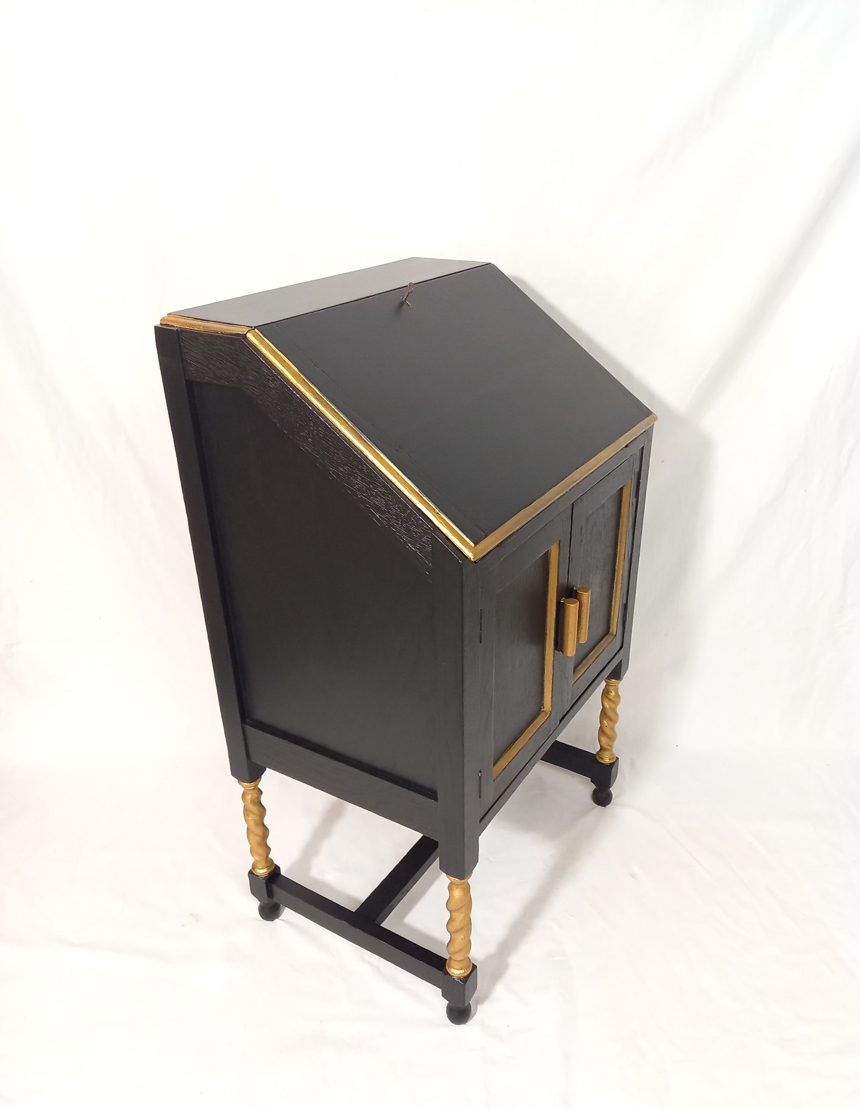Small secretary with black and gold lid