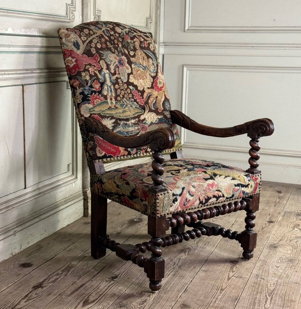 Carved walnut and tapestry armchair, late 17th century