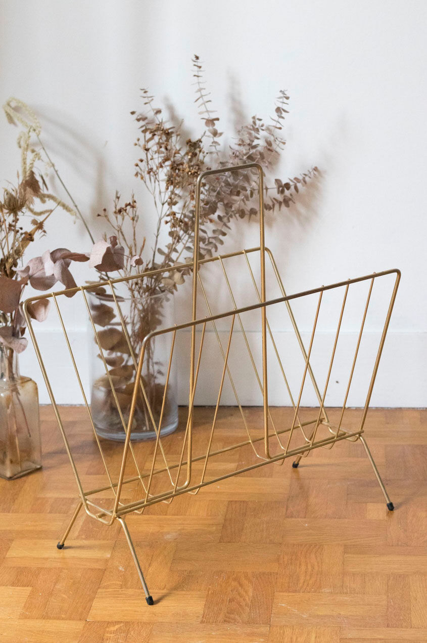 Vintage magazine holder in gold metal