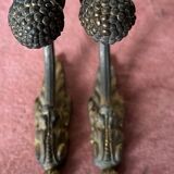 Pair of bronze coats