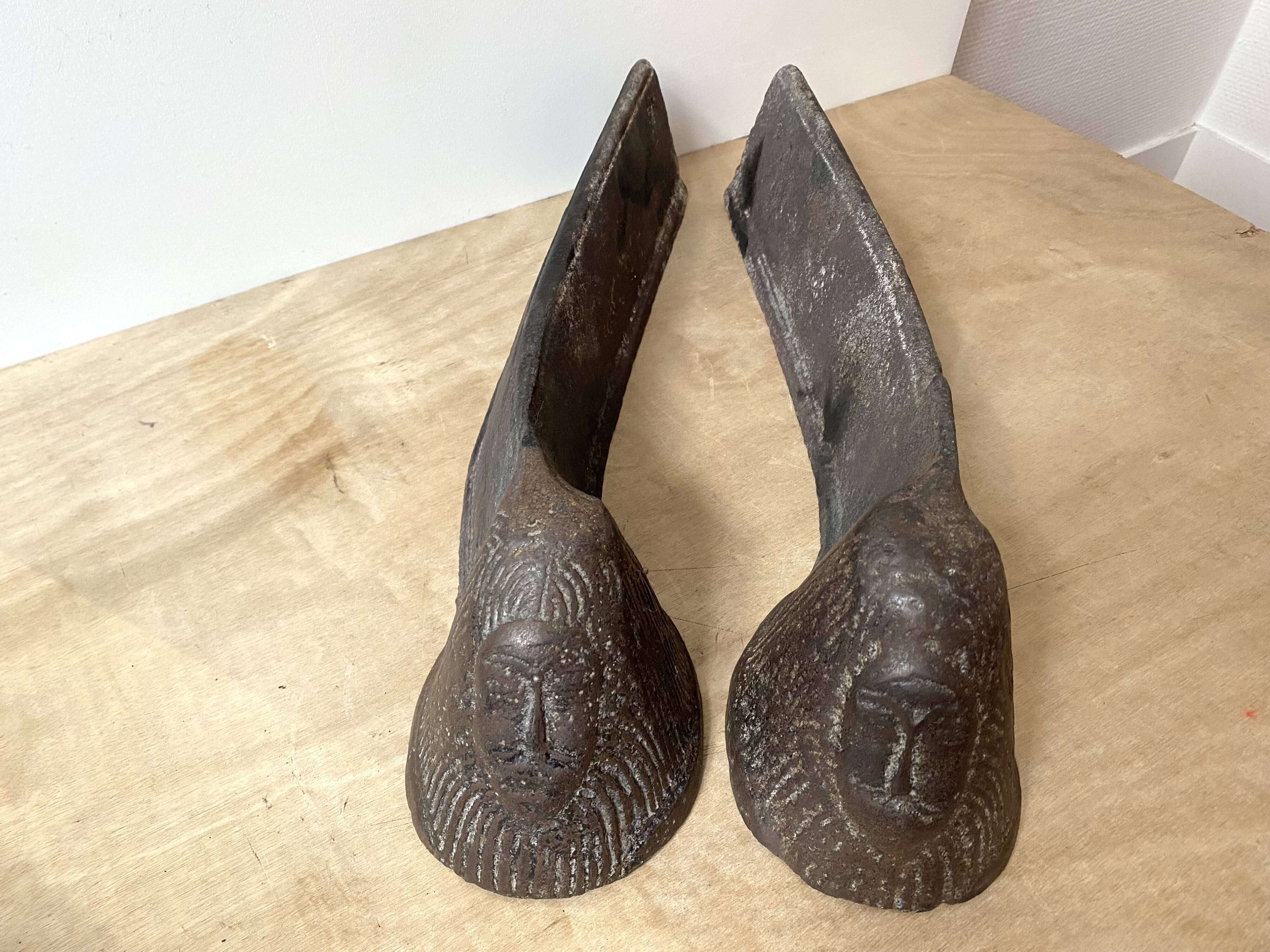 Pair of modernist anthropomorphic fireplace andirons, brutalist log holders 1950s