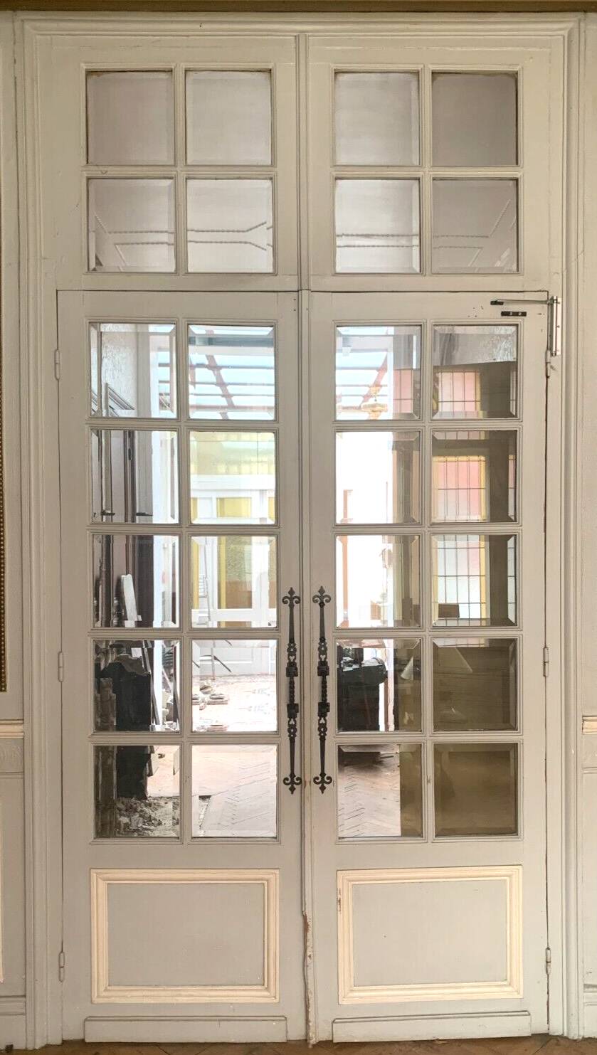 Double separation doors with transom and beveled glass 20th century