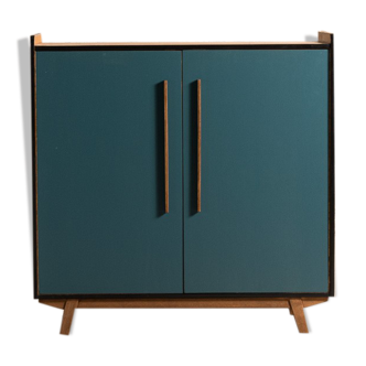 Vintage low sideboard restyled in blue with 2 swing doors and wooden base