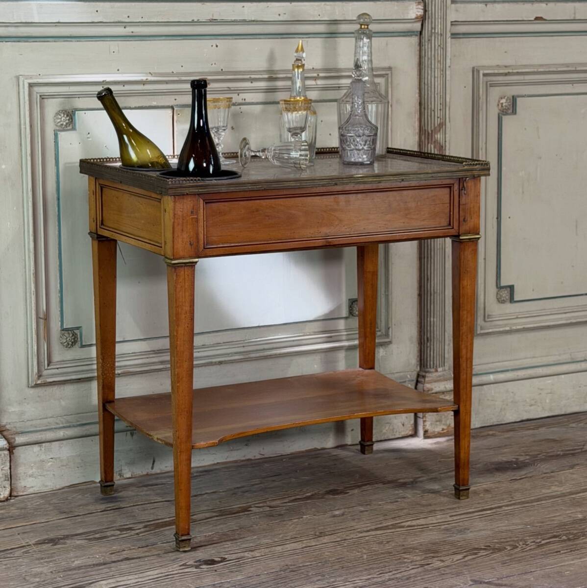 Louis XVI refreshment table in mahogany, brass and marble, 18th century.