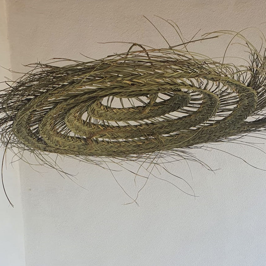 Doum pendant light in natural esparto