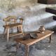 Brown Indonesian teak coffee table, with a border and cylindrical legs H40 L103.