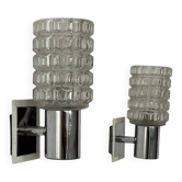 Pair of vintage wall lights, chromed metal and pressed molded glass, Italy, 1970