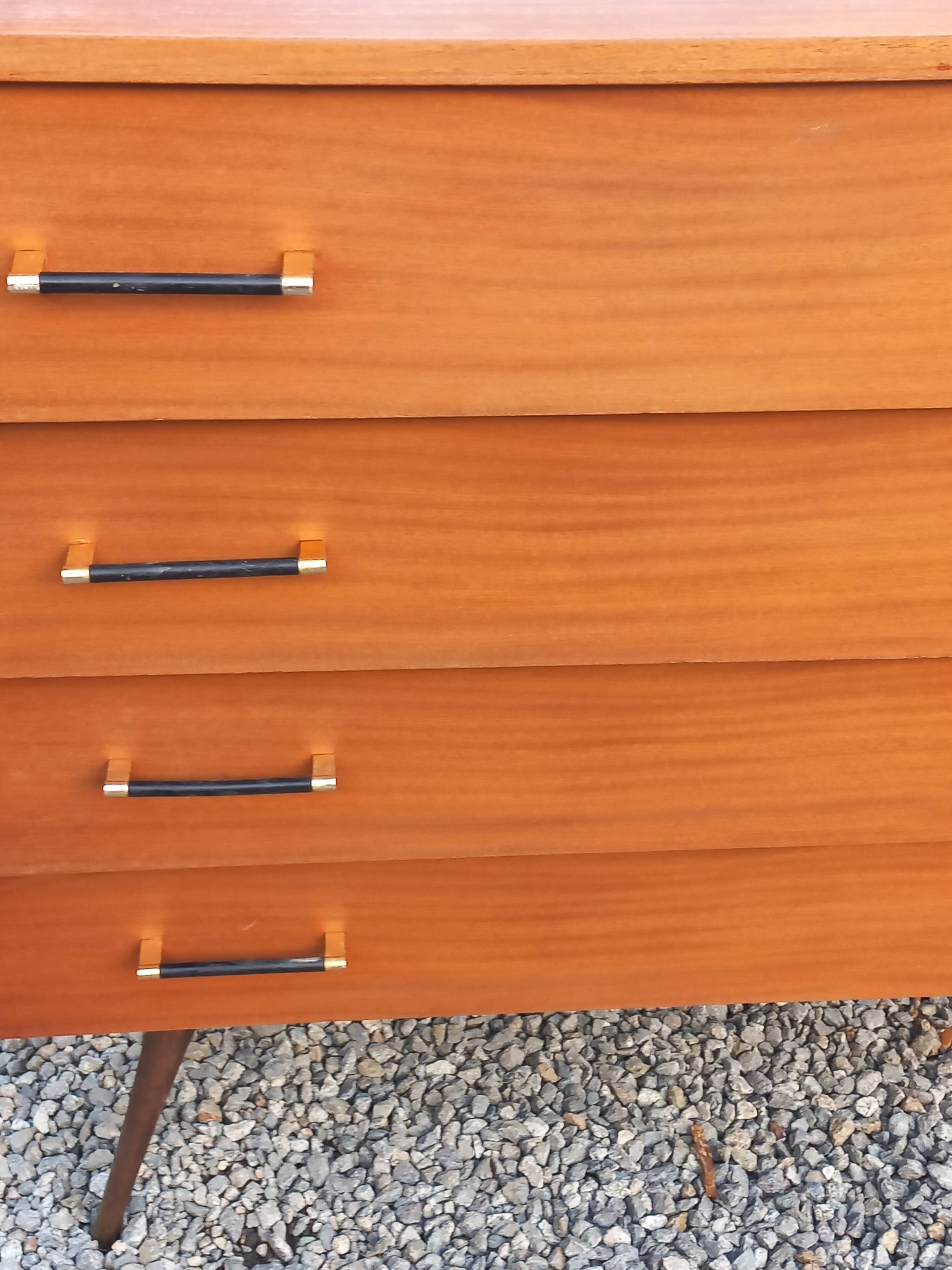 Vintage mahogany commode with metal tapered legs, 4 drawers, 1950s.