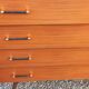 Vintage mahogany commode with metal tapered legs, 4 drawers, 1950s.