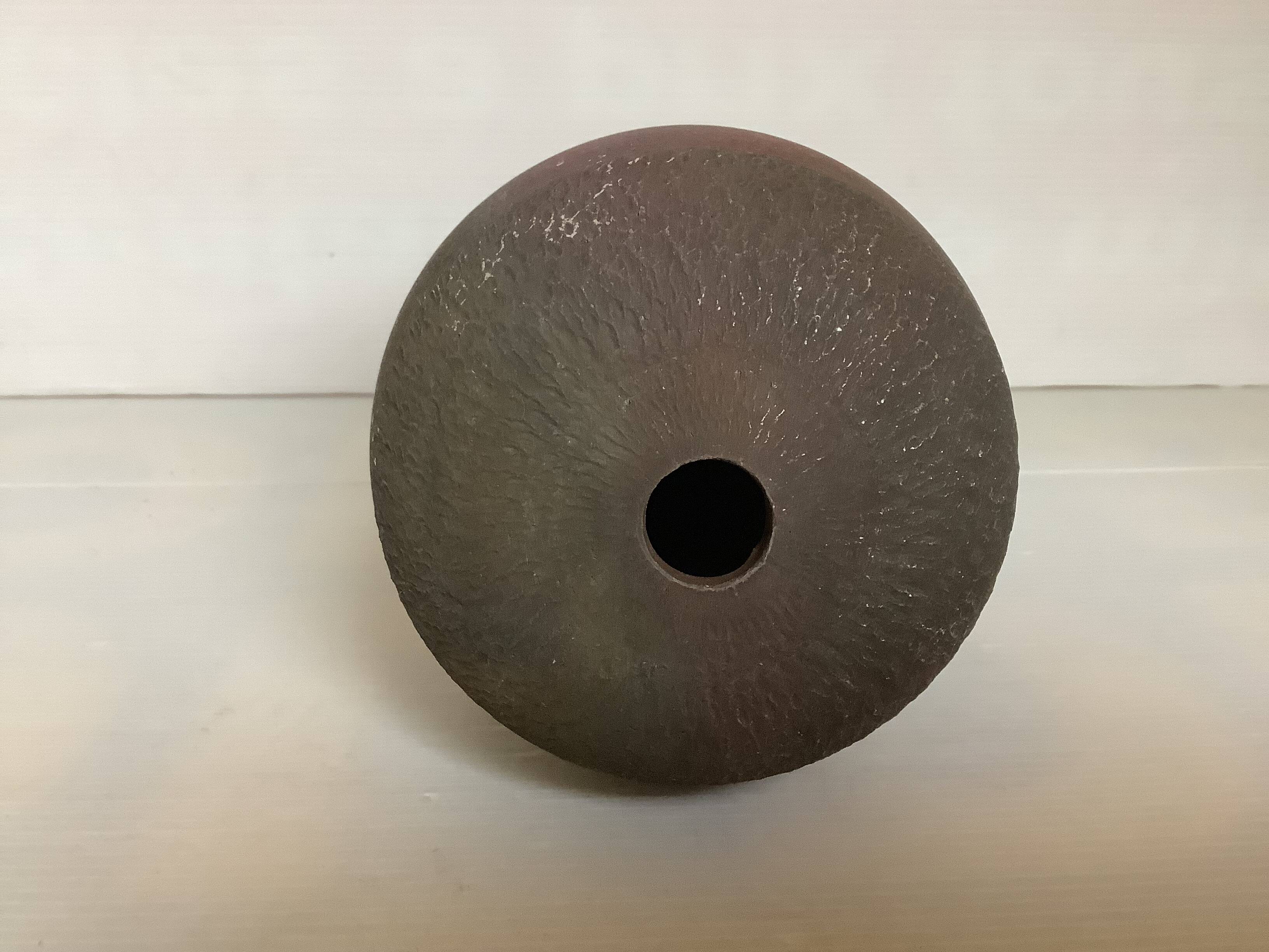 Asymmetrical vase by ceramicist Van Gompel